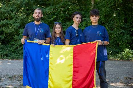 A group of people holding a flag
AI-generated content may be incorrect.